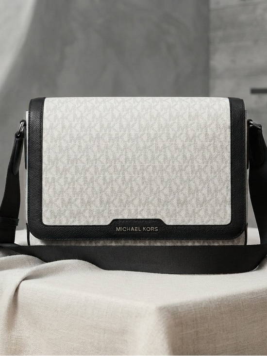 Michael Kors Handbags - Michael Kors White and Black Signature Unisex Messenger Bag